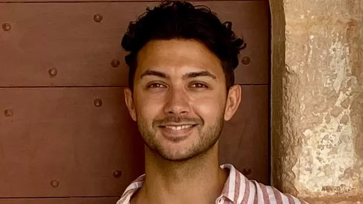 aziz photo